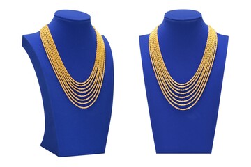 Gold necklace on blue velvet necklace display stand.