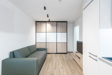 Modern Home Living Room Interior with Open TV Area and TV on the Wooden Desk