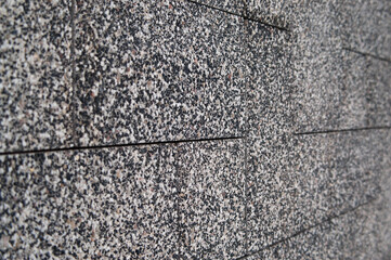 paving slabs of rectangular and square blocks made of stone chips