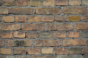 brown background, in the photo an old brick wall