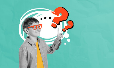 Curious child boy pointing upward with surprised expression and