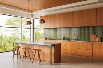 Modern wooden kitchen interior with green tile backsplash and large windows overlooking lush tropical trees and minimalist island design. 3D Rendering