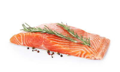 Piece of salmon fillet with spices isolated on white