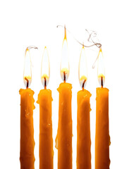Burning Hanukkah Candles with Flame Isolated on White
