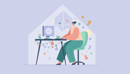 Woman works remotely in a cozy winter home office decorated for holidays