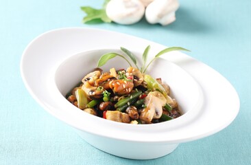 A Korean seafood dish made with fresh mussels and mushrooms simmered in savory soy sauce, creating a deep umami flavor. Crafted by Master Chef Hanshunseop. Photographed in Korea.
