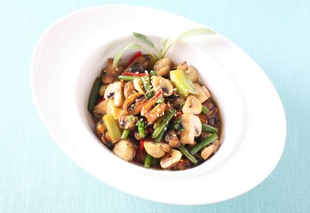 A Korean seafood dish made with fresh mussels and mushrooms simmered in savory soy sauce, creating a deep umami flavor. Crafted by Master Chef Hanshunseop. Photographed in Korea.