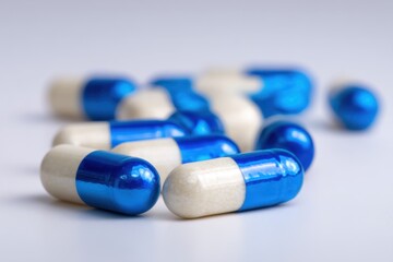 Blue and White Pharmaceutical Capsules Isolated: Close-Up of Medication for Healthcare, Medical Treatment, Drug Manufacturing, Pharmacy Concept, Pills for Wellness and Cure