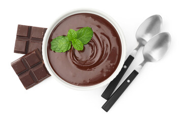 Melted chocolate with mint in bowl, pieces and spoons isolated on white, top view