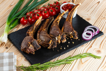 Grilled lamb shashlik on a wooden table
