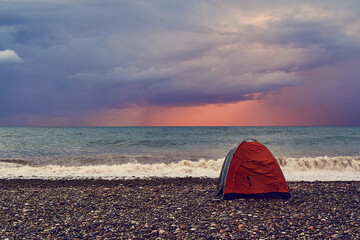 Tent on the beach during the storm in Batumi