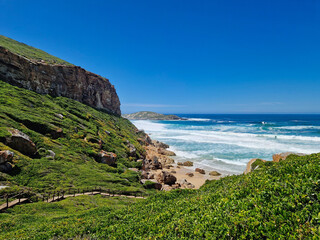 Hiking trail and ocean view from Robberg Nature Reserve, Plettenberg Bay, South Africa.