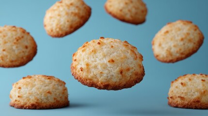 Culinary art floating coconut macaroons with golden edges captured in minimalist aerial perspective