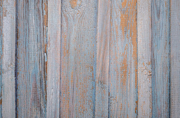 Wooden background in pastel shades of blue, gray, and orange