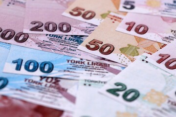 Turkish Liras currency money bills. TRY currency banknotes in pile with different denomination close up