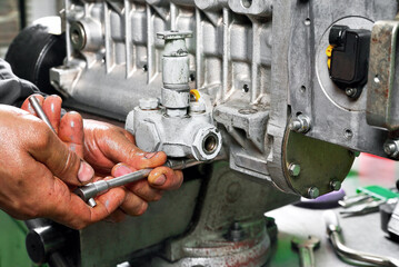 repair of fuel pump of eight-cylinder diesel engine installation of equipment and attachments on pump body