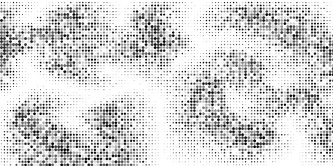 Abstract halfton background. A wave of black dots on a white background. The pattern is chaotic