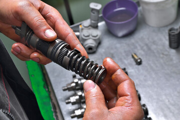 repair of diesel engine fuel pump assembly and assembly of plunger pairs and sections for subsequent installation on the engine