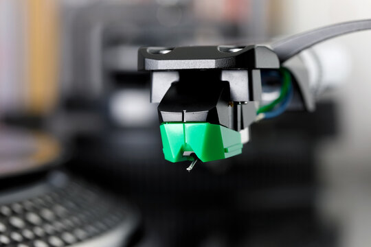 A cartridge, which is mounted in the headshell at the end of the tonearm, is used to read sound from a vinyl record