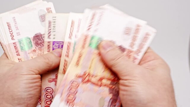 Counting cash in Russian banknotes at home