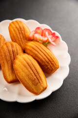 Madeleine cookies sweet dessert traditional french sweets tasty snack fresh delicious gourmet food background on the table rustic top view copy space