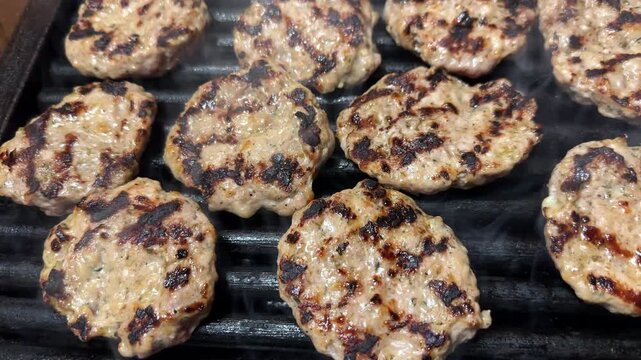 Kufte Meatballs with Pork and Beef Ground Meat on Grill, Traditional Balkan Bulgarian Serbian Food Cuisine