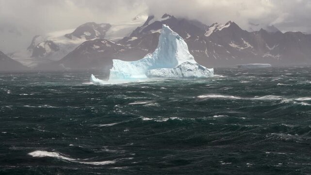 Big Iceberg in South Georgia Scenery, Amazing Shape Ice Formation of Massive Large Enormous Blue Icebergs in South Georgia Landscape Seascape with Ocean Sea Water