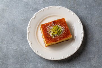 Revani - sweet semolina cake with pistachio, traditional turkish dessert