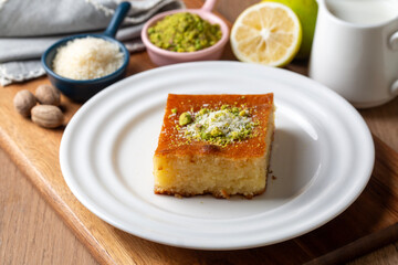 Revani - sweet semolina cake with pistachio, traditional turkish dessert