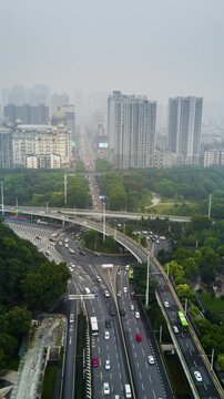 day time wuhan cityscape traffic street road aerial lakeside vertical panorama 4k timelapse china