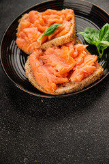 sandwich salmon smoked fish open sandwich delicious fresh portion size natural product tasty snack fresh delicious gourmet food background on the table rustic top view copy space pescetarian diet