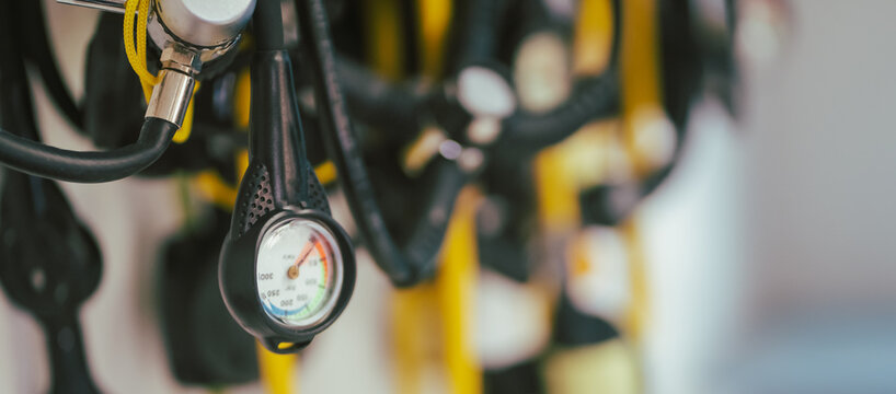 A diving equipment with regulators and tools for checking barrels.