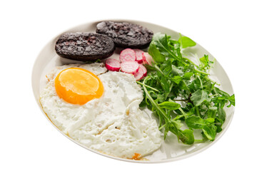 Eggs breakfast black pudding, egg, vegetables, arugula portion size natural product tasty snack fresh delicious gourmet food background on the table rustic top view copy space