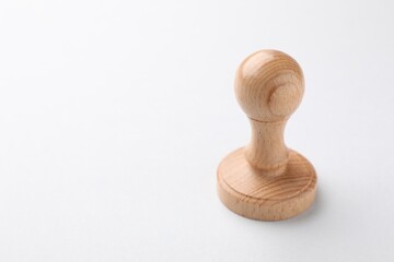One wooden stamp on white background, closeup. Space for text