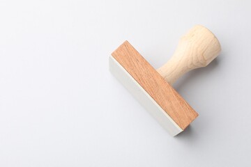 One wooden stamp on white background, top view. Space for text