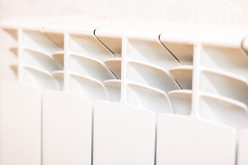 Neutraltoned apartment highlights functional heating system