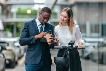Two Professionals Commuting to Work by Sustainable Urban Transport