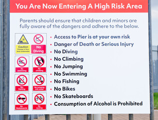 Safety sign at beach area near the sea in Aberdeen