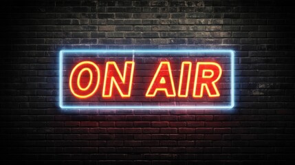 Neon sign glowing on a dark brick wall creating a vibrant atmosphere for live broadcasts and creative events