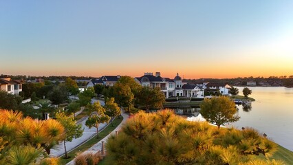 Aerial view of a peaceful  neighborhood with luxurious houses by Woodlands lake , Houston, Texas.