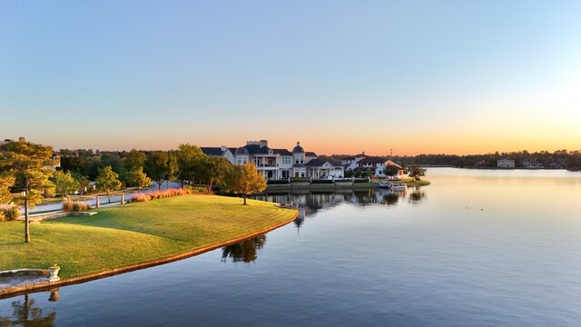 Aerial view of a peaceful  neighborhood with luxurious houses by Woodlands lake , Houston, Texas.