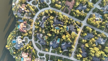 Aerial view of luxurious houses with swimming pool by Woodlands  lake, Houston,Texas
