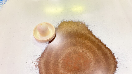 air hockey game table that has faded paint because it is too old