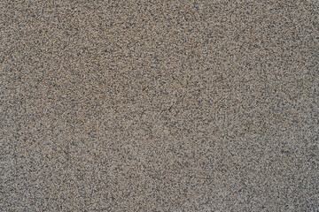 Aggregate asphalt texture creating grainy road surface background