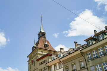 Obraz premium A building with a clock tower and a steeple in city Bern Switzerland