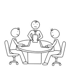 Three Colleagues Working Together at a Desk with a Laptop