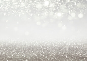 Christmas background with white glitters and bokeh lights