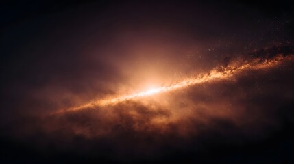 Obraz premium A breathtaking view of a vibrant cosmic nebula featuring a fiery orange core and a luminous golden streak set against a dark hazy interstellar