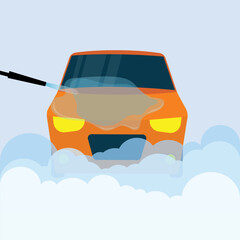 Orange automobile in a car washing service