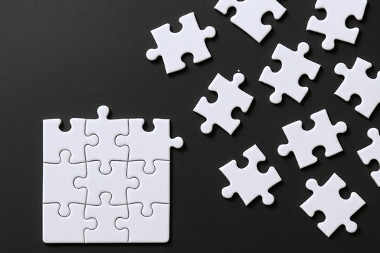 White Jigsaw Puzzle Assembled with Missing Piece on Black Background, Concept for Problem Solving - Powered by Adobe